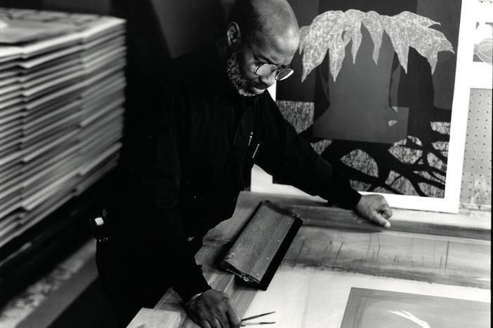 Lou Stovall, working in his studio