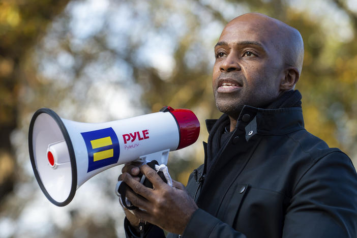 Human Rights Campaign president Alphonso David speaks to supporters on Saturday Dec.19, 2020 during a get-out-the-vote event at a private residence in Dunwoody, Ga. David has filed a lawsuit against the organization in federal court, alleging that he was underpaid and then terminated because he is Black.