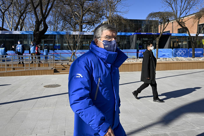 Thomas Bach (L), President of the International Olympic Committee attends the Olympic Truce Mural ceremony at Beijing 2022 Winter Olympic Games village Feb. 1, 2022, in Beijing, China