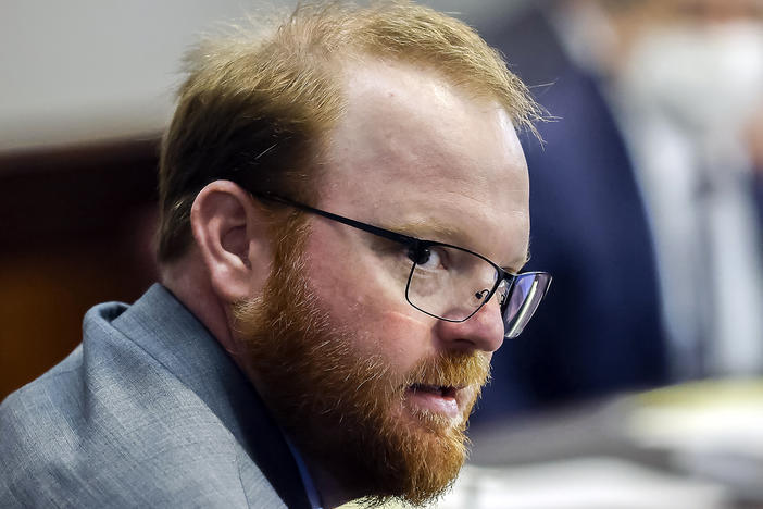 Travis McMichael looks on during the sentencing in his trial along with his father Greg McMichael and neighbor, William Bryan in on Jan. 7, 2022, in Brunswick, Ga.