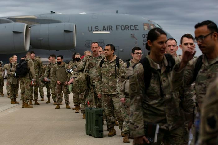 U.S. troops deploy for Europe from Pope Army Airfield at Fort Bragg, N.C., on Feb. 3.