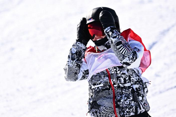 USA's Julia Marino reacts after crossing the finish line as she competes in the snowboard women's slopestyle final run during the Beijing 2022 Winter Olympic Games.