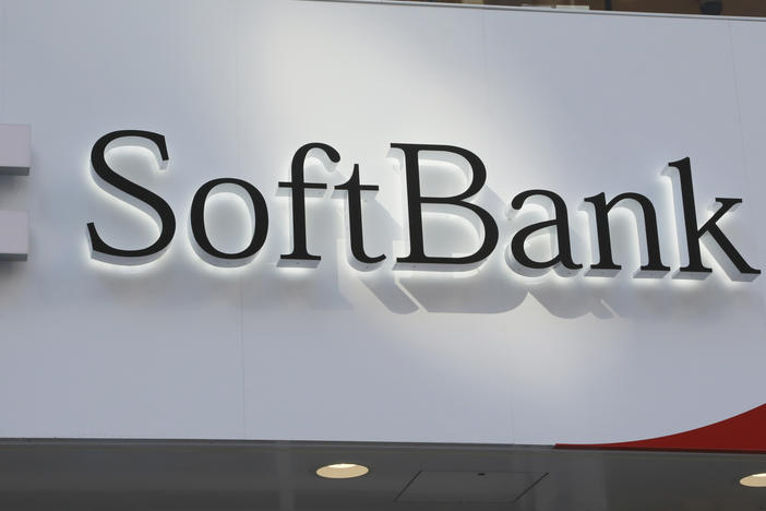 The logo of SoftBank Corp. is seen at a shop in Tokyo on Monday. Profit at the Japanese technology investor has tumbled as the value of its sprawling investments declined and its planned sale of British company Arm collapsed.