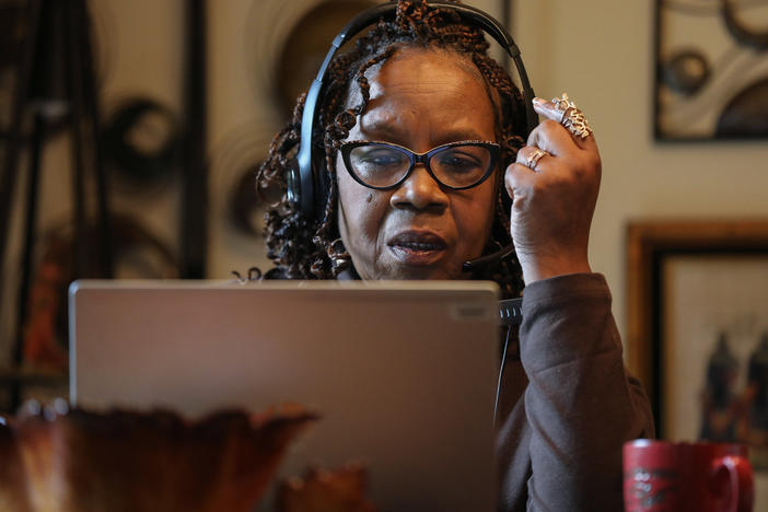 Contact tracing programs around the country have been struggling to keep up with demand during the last several coronavirus surges. Here, contact tracer Cherie Hunter works from her home in Tinley Park, Ill., to reach people who have tested positive for COVID-19.