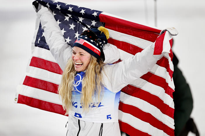 Jessie Diggins of Team USA celebrates after winning the bronze medal in the women's cross-country sprint event on Day 4 of the Beijing 2022 Winter Olympic Games in China.