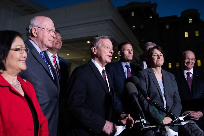 Democratic members of the Senate Judiciary Committee, including Chairman Dick Durbin (center) of Illinois, speak to reporters following a meeting with President Biden about the Supreme Court vacancy.