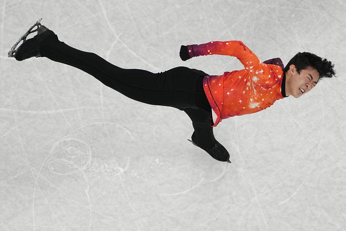 Nathan Chen, of the United States, competes in the men's free skate program during the figure skating event at the 2022 Winter Olympics, Thursday, Feb. 10, 2022, in Beijing.