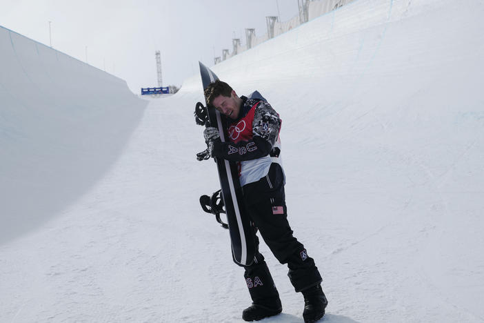 White gets emotional after the men's halfpipe finals at the Beijing Olympics.