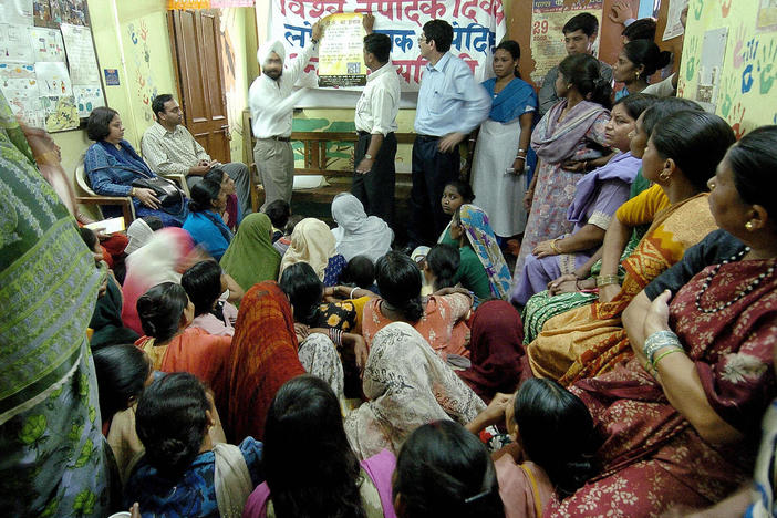 Health workers share information about tuberculosis with residents of aslum neighborhoods in New Delhi. India has the greatest number of TB cases in the world.