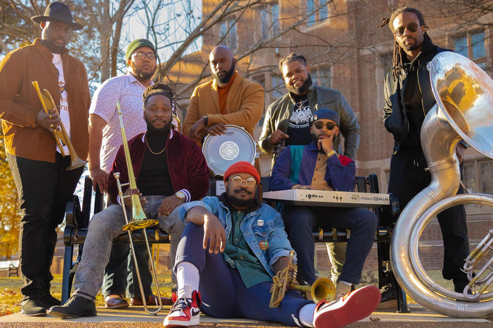 The members of Brassville. From left, back row, standing: Jonathon Neal, MarVelous Brown, Derrick Greene, Adrian Pollard, Nate McDowell; seated on bench: Marcus Chandler and Rashad Sylvester; center, seated on ground: Larry Jenkins, Jr.