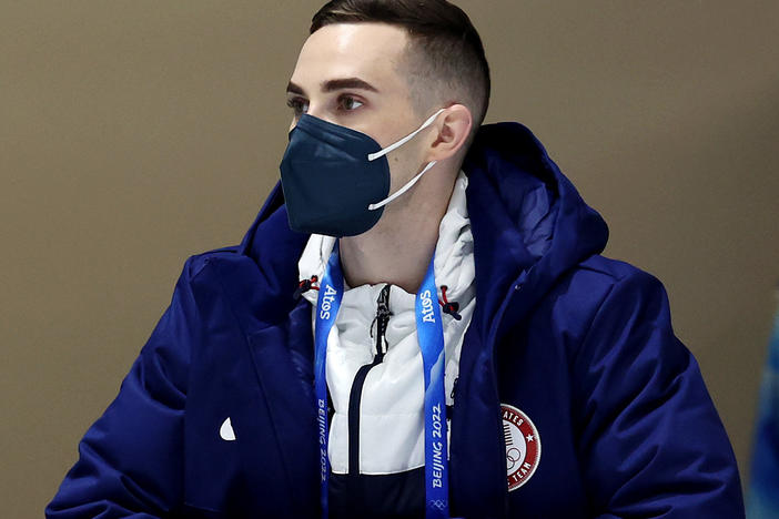 Mariah Bell of Team United States talks with coach and former Olympic figure skater Adam Rippon during a practice session ahead of the Beijing 2022 Winter Olympic Games on Feb. 1, 2022.