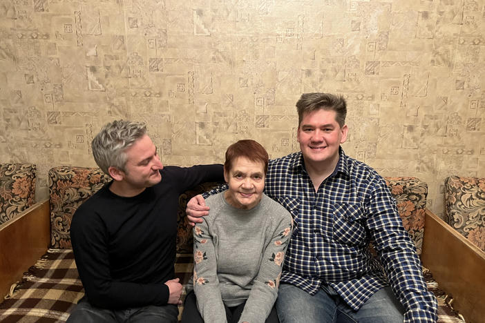 NPR's Daniel Estrin, left, with Lusia Kuznetsova, center, and her son Sergey Kuznetsov. Lusia is Estrin's grandfather's first cousin. Their extended families in the U.S. and Soviet Union went for decades without contact.