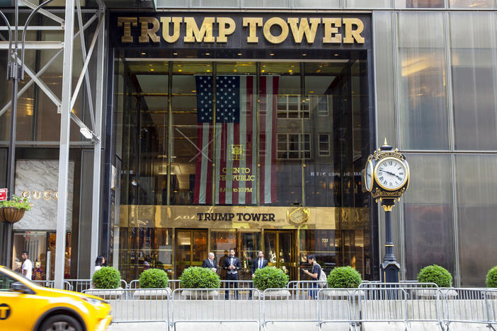 A taxi passes by Trump Tower, the headquarters of the Trump Organization, in New York City in 2021.