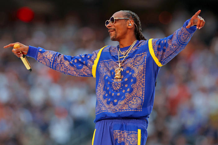 Snoop Dogg performs during the Super Bowl LVI halftime show Sunday at SoFi Stadium in Southern California. He and original "American Idol" winner Kelly Clarkson will host a new nationwide songwriting competition on NBC.