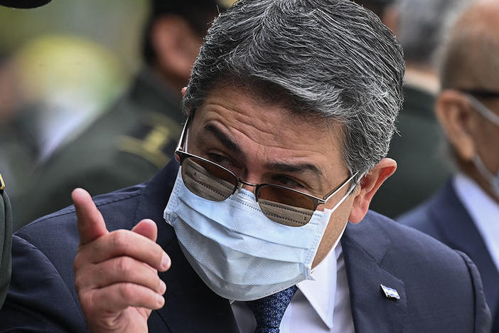 Juan Orlando Hernandez is shown taking part in the celebration of the 196th anniversary of the Army of Honduras in Tegucigalpa, on Dec. 10, 2021, while he was still president.