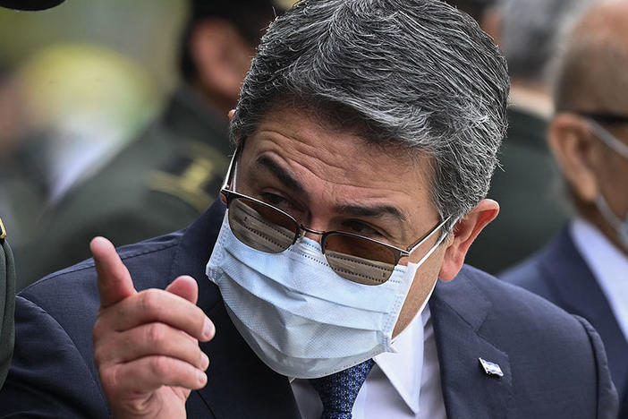 Juan Orlando Hernandez is shown taking part in the celebration of the 196th anniversary of the Army of Honduras in Tegucigalpa, on Dec. 10, 2021, while he was still president.