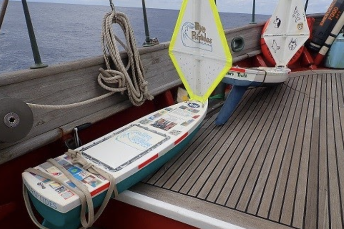 The <em>Rye Riptides</em> pictured on board the Corwith Cramer before launching in October 2020. Nearly 18 months later, the mini boat was retrieved from an uninhabited Norwegian island with its messages and gifts intact.
