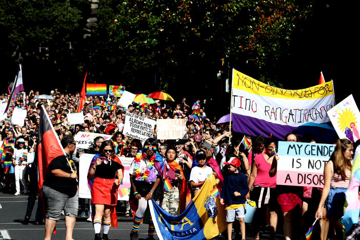 People march up Queen Street in Auckland, New Zealand, during the annual Pride Festival in February 2019. Three years later, lawmakers banned conversion practices by a near-unanimous vote.