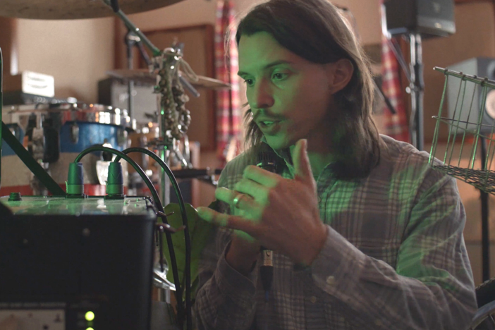 "When we experienced [the bike generators] for the first time in 2012, it rewired my brain in how I understand my use of electricity," says Illiterate Light member Jake Cochran, pictured.