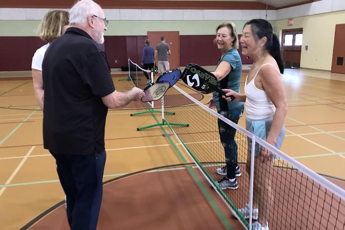 Freida Yueh (right) says of the increasingly popular sport of pickleball: "It's addictive so we just started playing and now with our other friends and relatives—actually everybody we know now plays pickleball."