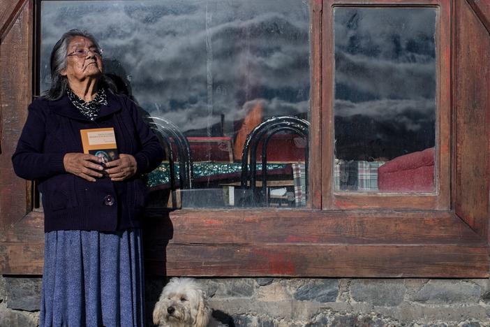 Cristina Calderón, the last known native speaker of the Yaghan language, poses outside of the local community center in Puerto Williams, southern Chile, on April 23, 2017.