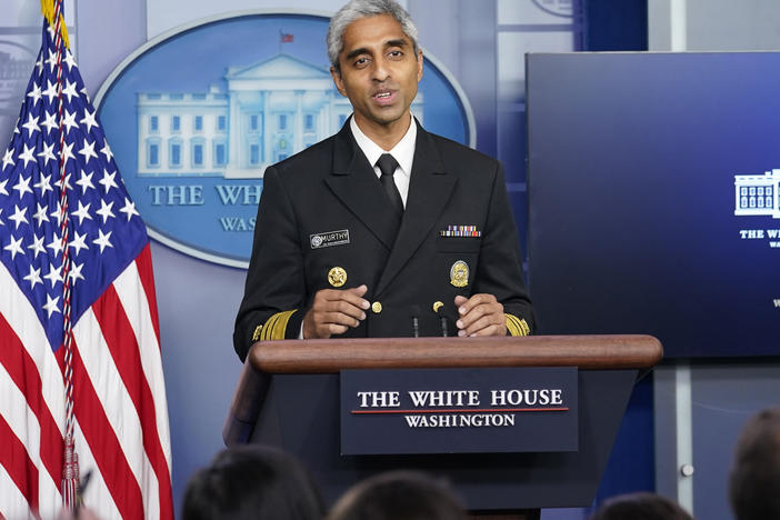 U.S. Surgeon General Dr. Vivek Murthy speaks during the daily briefing at the White House in Washington. Murthy says that he and the rest of his immediate family have tested positive for COVID-19.