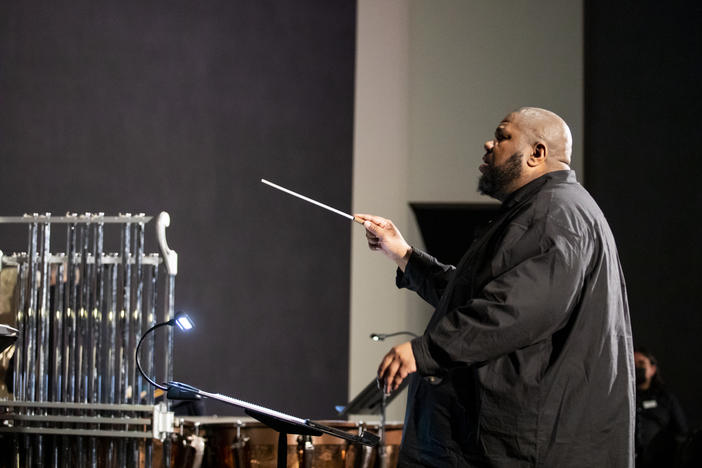Composer, conductor and multi-instrumentalist Tyshawn Sorey leads a rehearsal of his <em>Monochromatic Light (Afterlife) </em>at the Rothko Chapel in Houston on Feb. 18.