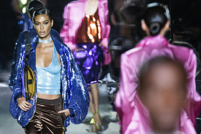 Models walk the runway at the Tom Ford spring/summer 2022 fashion show at Lincoln Center during New York Fashion Week on Sunday, Sept. 12, 2021.