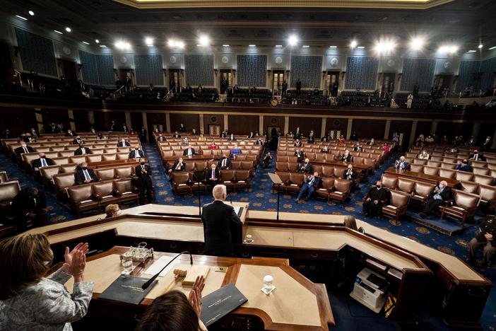 President Biden's State of the Union speech Tuesday will be his first since becoming president. But in April 2021, he addressed a joint session of Congress, with House Speaker Nancy Pelosi and Vice President Harris behind him on the dais.