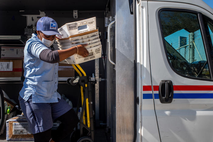 A US Postal service employee unloads mail at a facility on February 10, 2022 in Houston, Texas. On February 8, the House of Representatives passed the Postal Service Reform Act of 2022 (H.R. 3076). The legislation will address operational and financial issues that the agency has been grappling with for years.