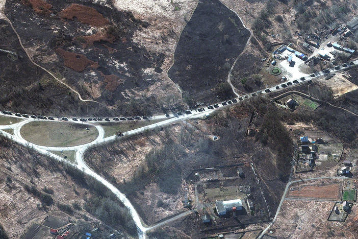 Satellite images show a Russian military convoy north of Kyiv.