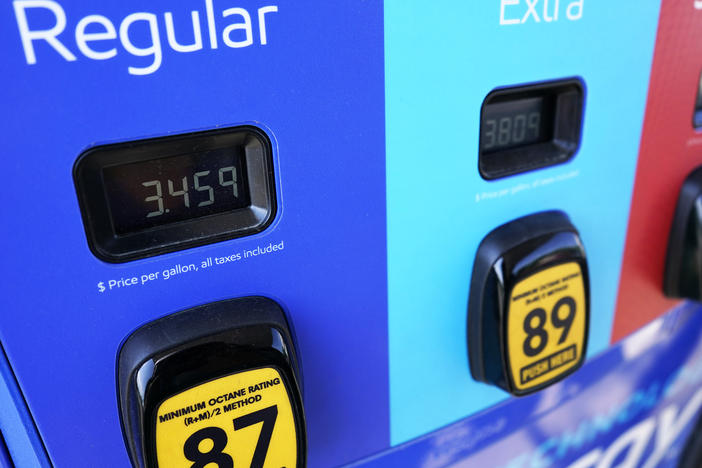 Gas prices are seen at a gas station in Vernon Hills, Ill., on June 11, 2021. Crude prices continued to gain on Thursday even after the U.S. and 30 other countries announced a coordinated release of oil from their reserves.