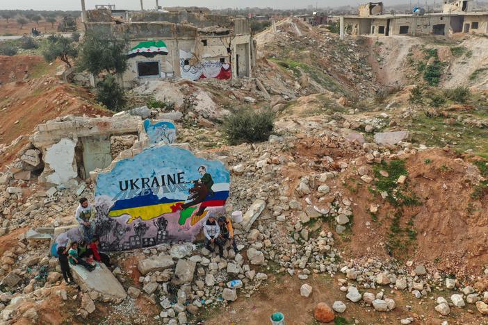As Russian forces began their invasion of Ukraine last week, artists in the Syrian city of Binnish painted a mural to show solidarity with Ukraine. It was painted on what's left of a home destroyed by Russian aircraft during Syria's civil war.
