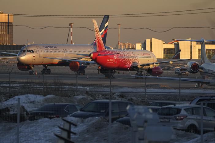 Aeroflot passengers planes are seen parked at Sheremetyevo Airport, outside Moscow, on  Tuesday. Russia's largest airline, Aeroflot, said Monday that it suspended flights to New York, Washington, Miami and Los Angeles because Canada had closed its airspace to Russian planes.