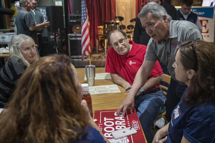 Rep. Jody Hice, R-Ga., speaks with supporters during a campaign event at the Flying Machine restaurant in Lawrenceville, Ga. Hice, one of the nation's preeminent election deniers, is running for Georgia secretary of state.