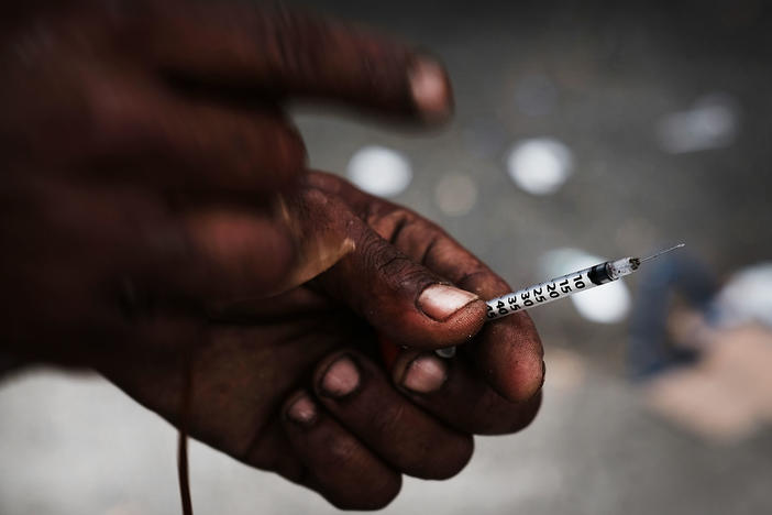 A heroin user in a South Bronx neighborhood which is experiencing an epidemic in drug use, especially heroin and other opioid based drugs.