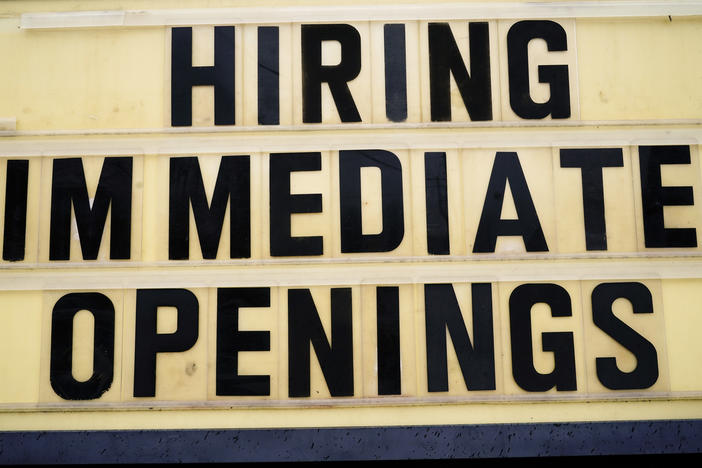 A hiring sign is posted outside a business in Huntingdon Valley, Pa., on Feb. 22. Employers are keen for workers as the economy continues to recover from the pandemic.
