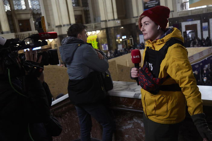 Journalists report from Kyiv, Ukraine, on March 2. Media coverage of Russia's invasion of Ukraine has been massive.