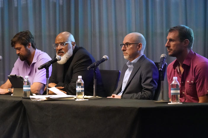 Tony Clark, second from left, executive director of the Major League Baseball Players Association, appears at a news conference with, from left, free agent pitcher Andrew Miller, chief union negotiator Bruce Meyer and New York Mets pitcher Max Scherzer on Tuesday, March 1, 2022, in Jupiter, Fla. The players' union has launched a $1 million fund to assist workers impacted by canceled games.