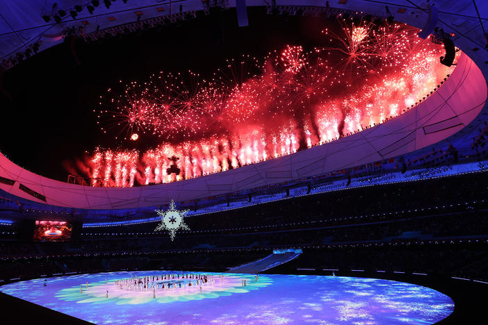 Fireworks are seen as the Olympic cauldron is lit during the Opening Ceremony of the Beijing 2022 Winter Paralympics at the Beijing National Stadium on March 04, 2022 in Beijing, China.