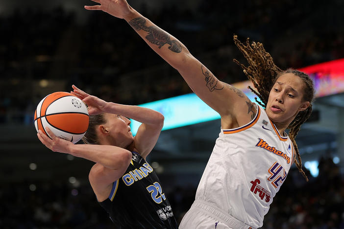 WNBA players Brittney Griner (right) of the Phoenix Mercury and Courtney Vandersloot of the Chicago Sky compete during the WNBA Finals in Chicago in October 2021.
