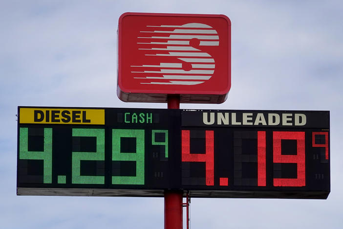 Gas prices are displayed on a sign at a gas station on March 3, 2022 in Hampshire, Il.