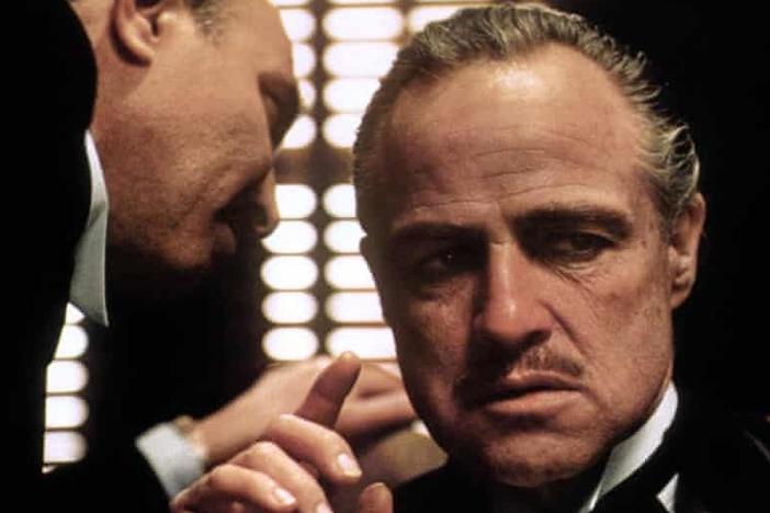 Marlon Brando in the film The Godfather (1972). Producers worried that at 47 he was difficult, and past his prime, but he won (and then declined) an Oscar for Best Actor.