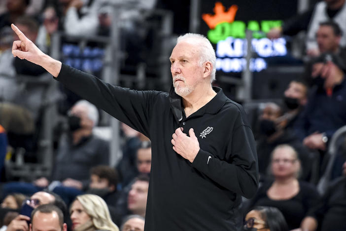 Gregg Popovich of the San Antonio Spurs became the winningest coach in NBA regular-season history on Friday, getting his 1,336th victory when the San Antonio Spurs rallied to beat the Utah Jazz, 104-102.