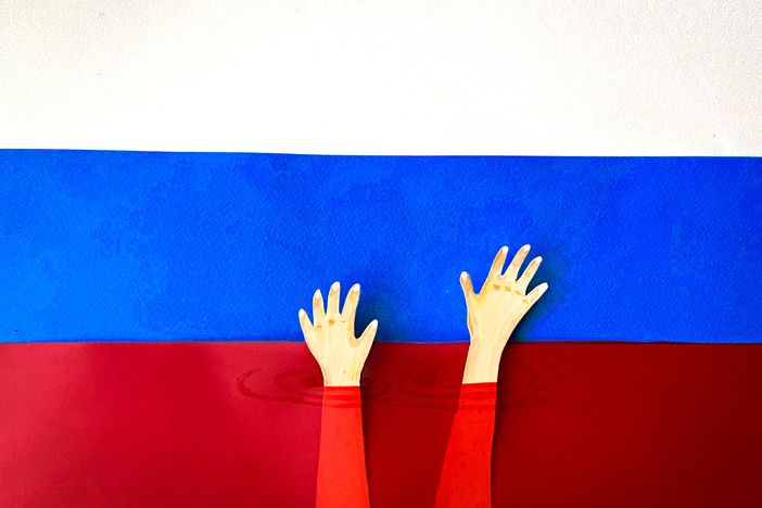 Valeriya Kamelkova, artist and sculptor, illustrates the Russian flag and a pool of blood.