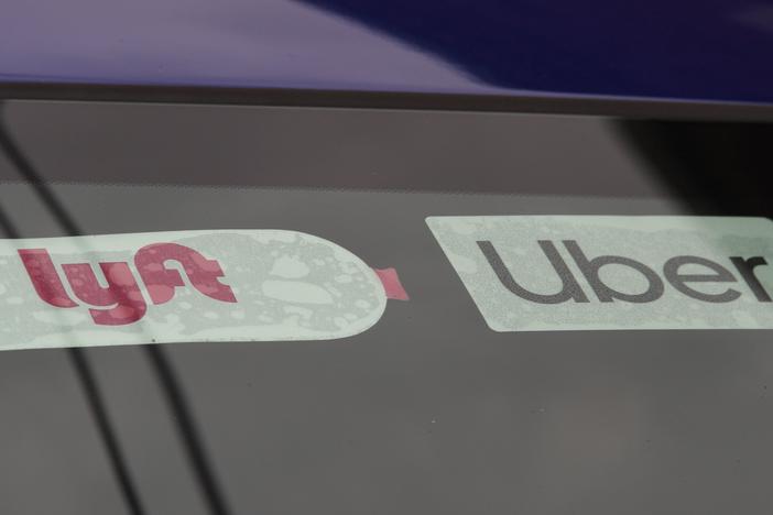 Ride-share companies Lyft and Uber announced they will add a temporary surcharge on their rides to help their drivers deal with the rise in gas prices.