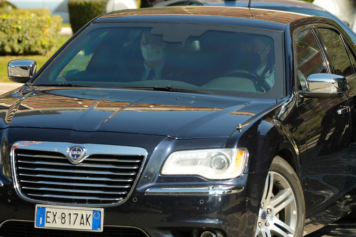 A car carrying members of the Chinese delegation leaves the Cavalieri Hilton hotel in Rome, where U.S. national security adviser Jake Sullivan and Chinese diplomat Yang Jiechi met on Monday.