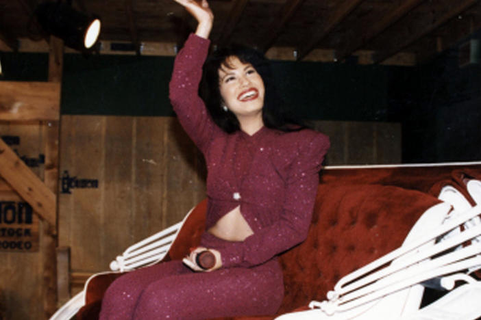 American singer Selena rides in a carriage during a performance at Houston's Astrodome on Feb. 26, 1995. The performance was her last before the 23-year-old's murder the following month.