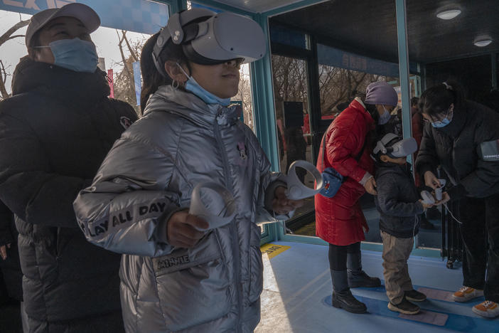 Children play a virtual reality game a Beijing 2022 Winter Olympics Live Site set up on February 07, 2022 in Beijing, China.