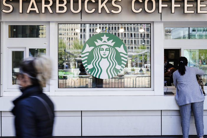 Customers at Starbucks stores in the U.S. and Canada will be able to provide a reusable cup for their drink by the end of next year, the company announced Tuesday.